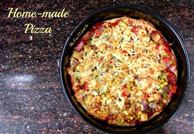 Easy, step by step, a foolproof recipe of homemade pizza. Also, learn details of making your own pizza dough and pizza sauce in quick and easy steps in an oven and gas tandoor. #theerailivedin #homemadePizzaRecipe #PizzaRecipes #IndianPizza #pizza #