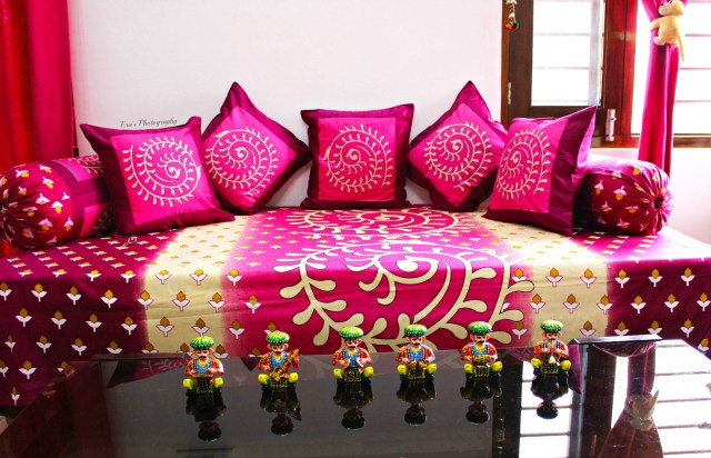 In colors of passion this majestic Diwan-set gifted our drawing room a vibrant touch blending well with the curtains.